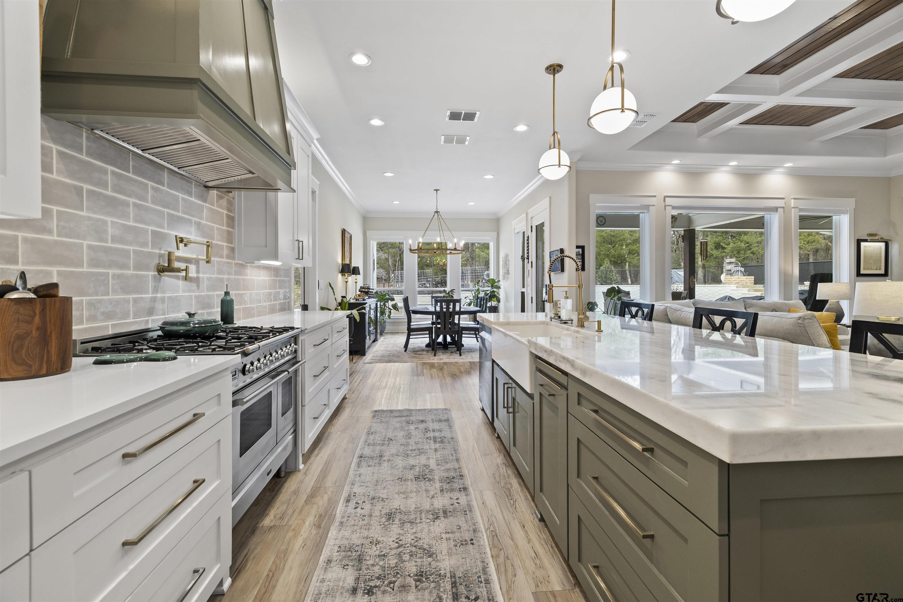23316 Fm 1995 Lindale, TX 75771 - Photo 12 of 47 a large kitchen with stainless steel appliances granite countertop a lot of counter space and a sink