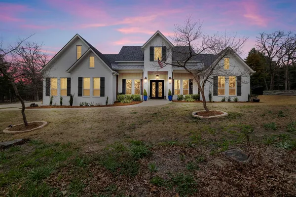 a living room with furniture fireplace and a flat screen tv