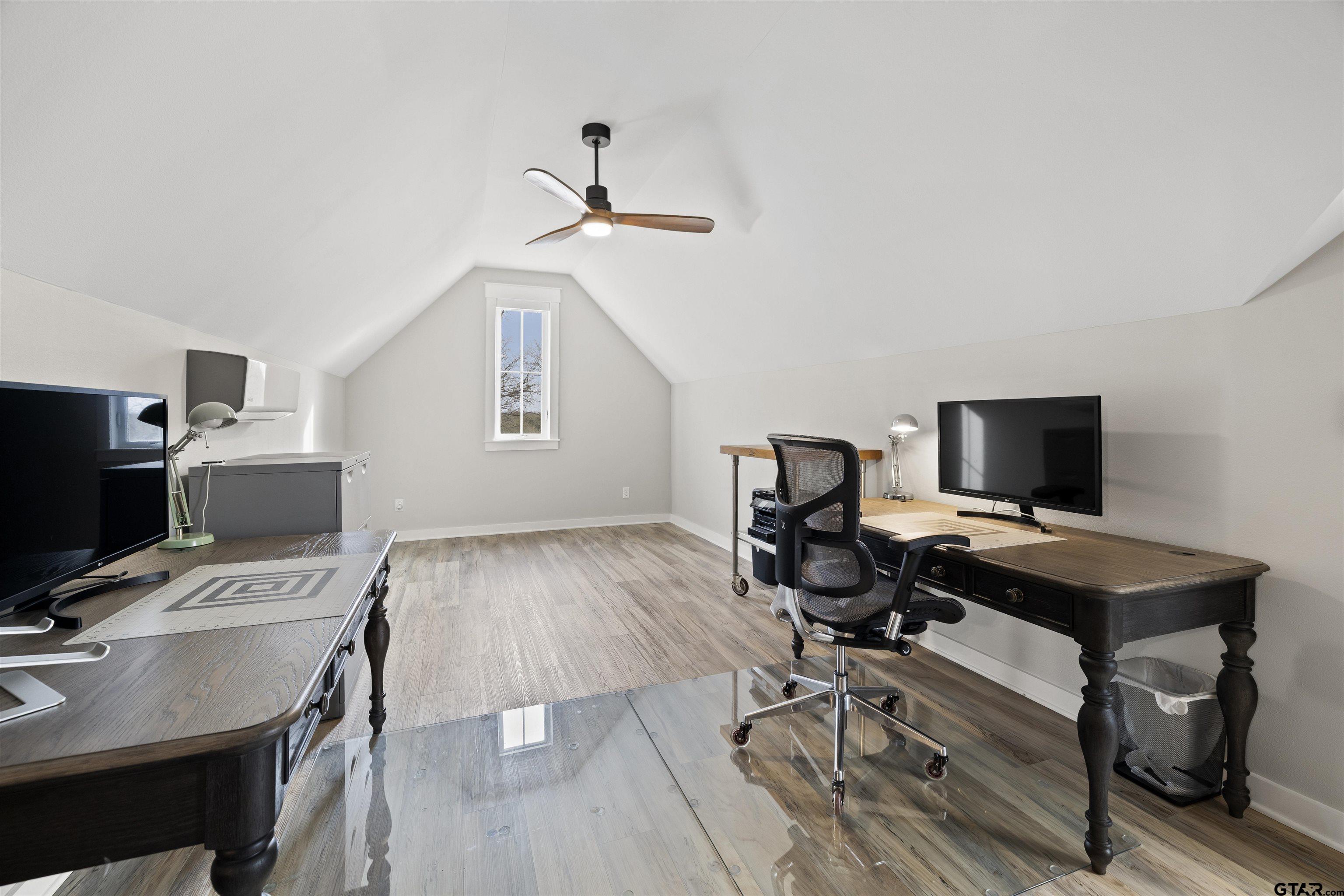 23316 Fm 1995 Lindale, TX 75771 - Photo 33 of 47 a view of a workspace with furniture and wooden floor
