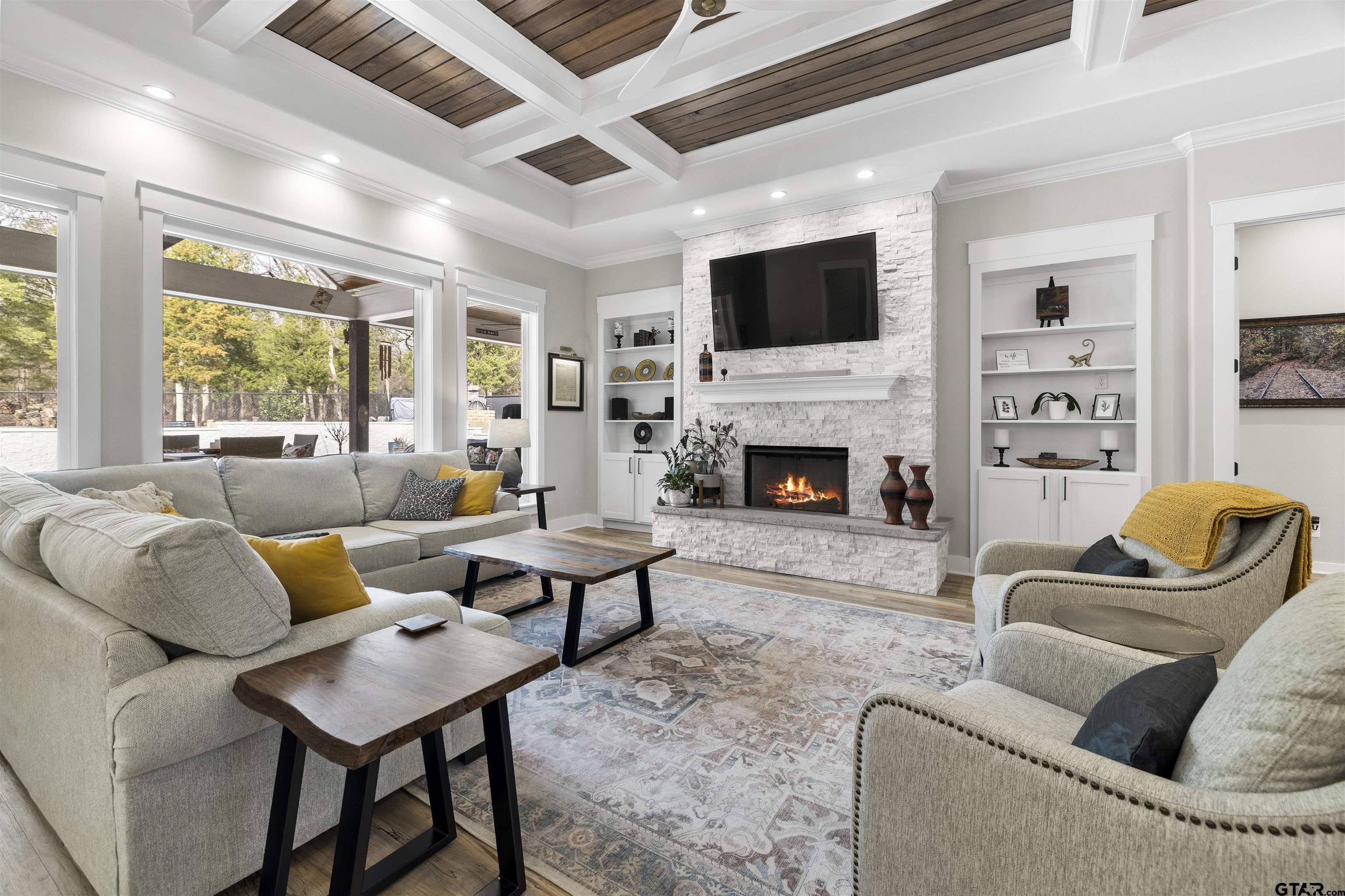 23316 Fm 1995 Lindale, TX 75771 - Photo 6 of 47 a living room with furniture fireplace and a flat screen tv