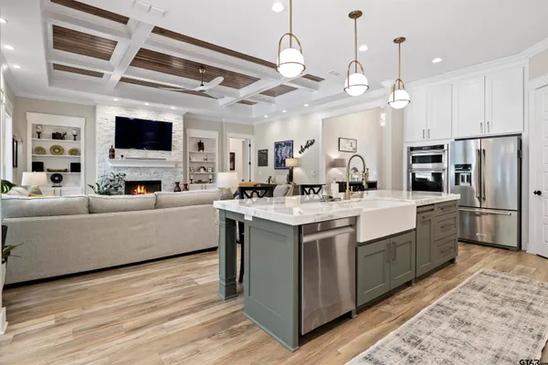 a kitchen with a sink and cabinets