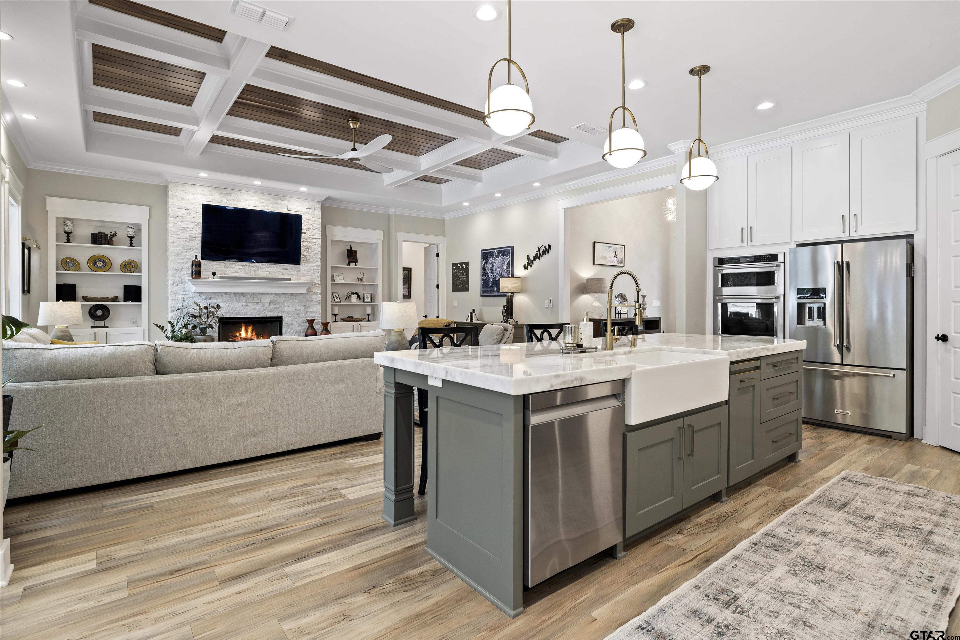 23316 Fm 1995 Lindale, TX 75771 - Photo 10 of 47 a living room with stainless steel appliances kitchen island granite countertop a sink a stove and a refrigerator