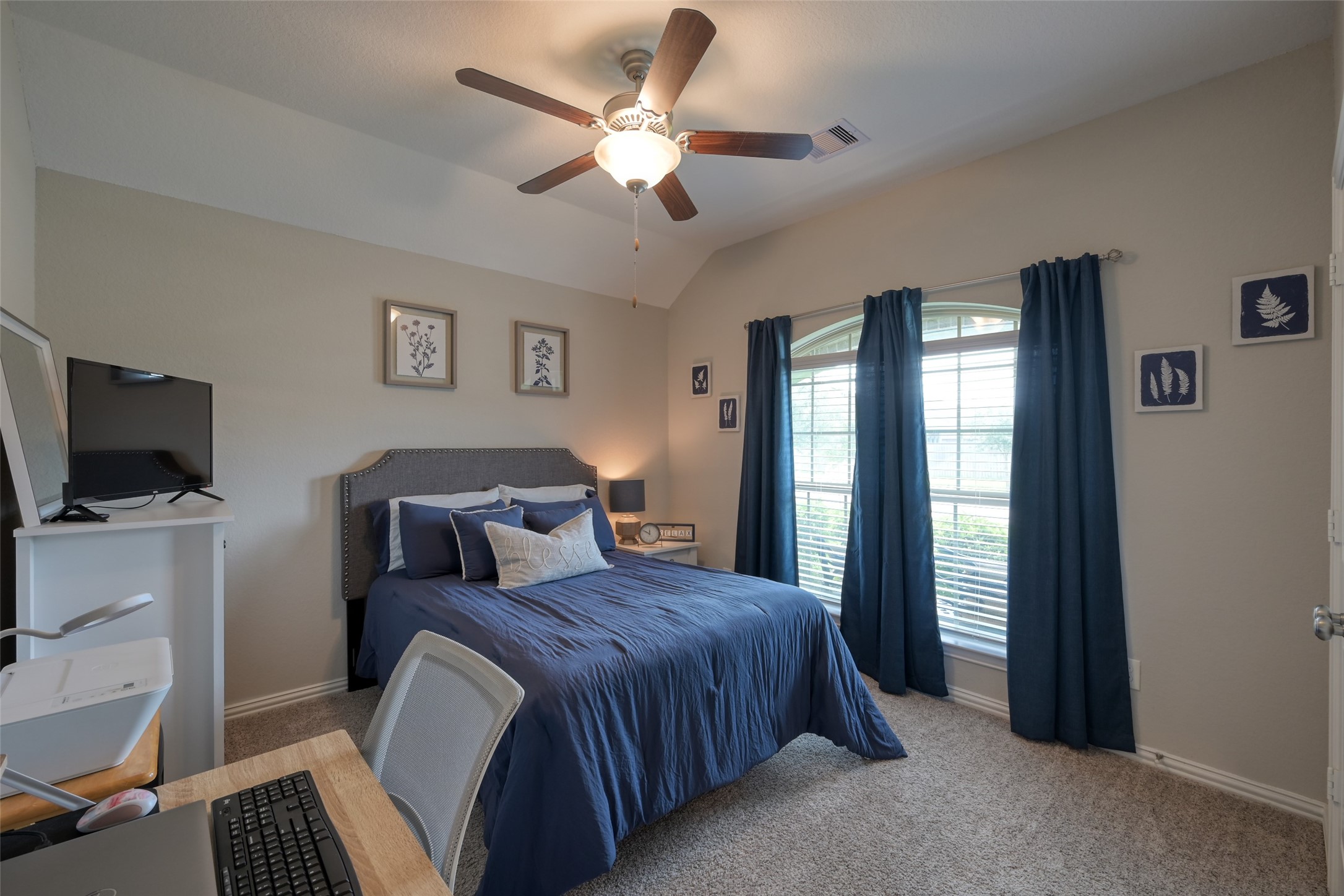 3465 Stablewood Grove Lane Spring, TX 77386 - Photo 23 of 50 a bedroom with a bed and a flat screen tv