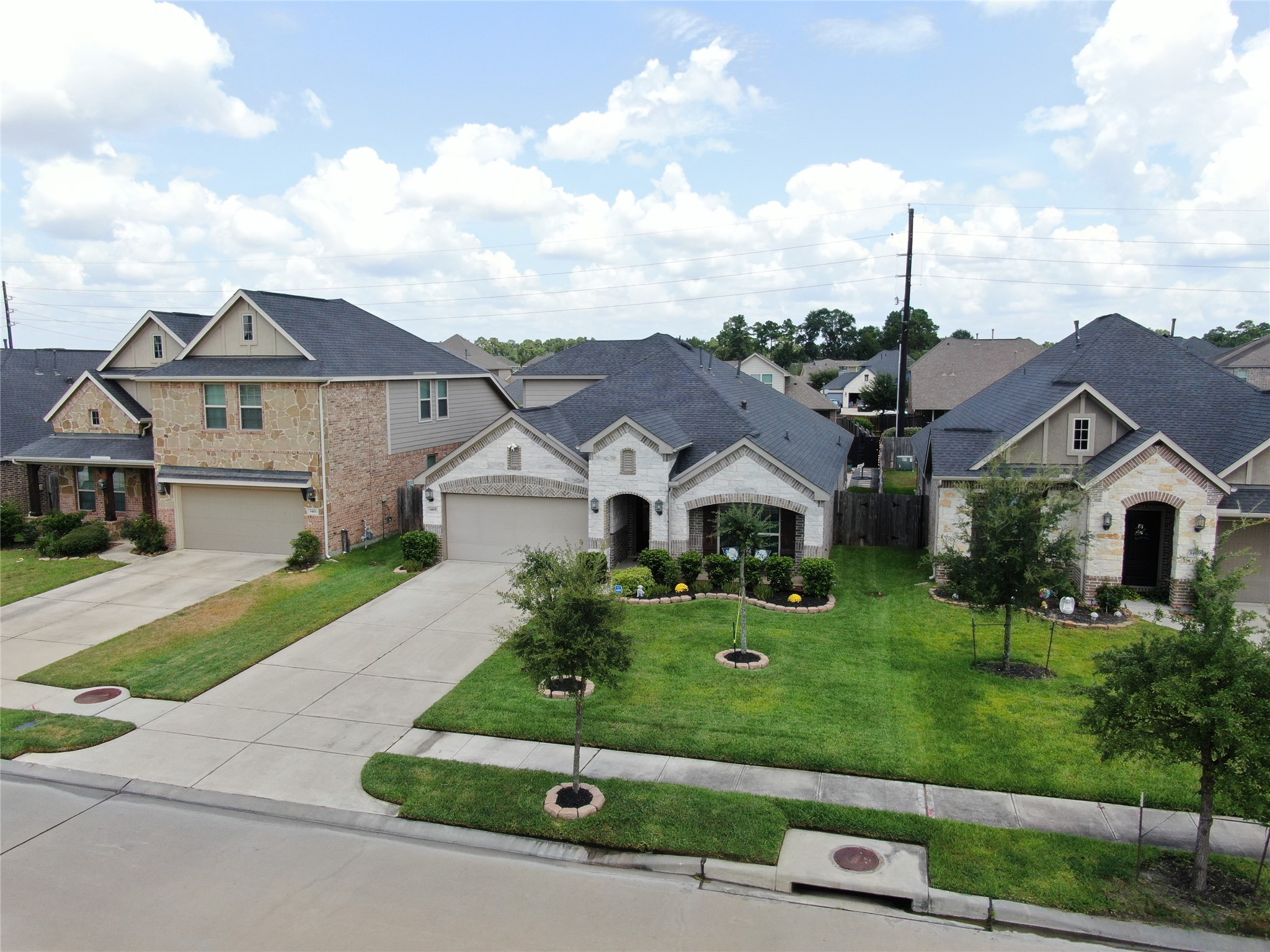 3465 Stablewood Grove Lane Spring, TX 77386 - Photo 4 of 49 a front view of a house with a yard