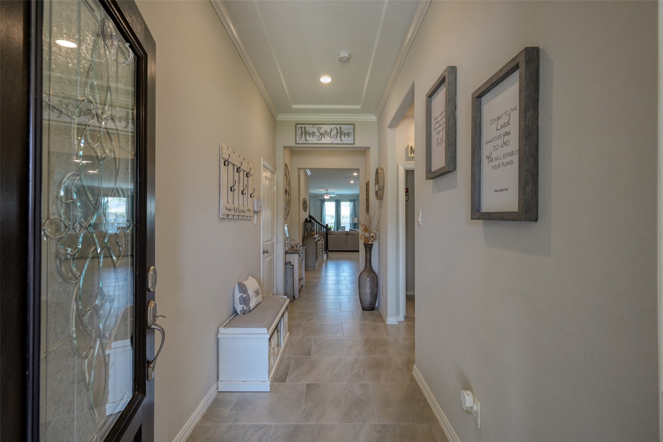 3465 Stablewood Grove Lane Spring, TX 77386 - Photo 5 of 50 a view of a hallway with wooden shelves