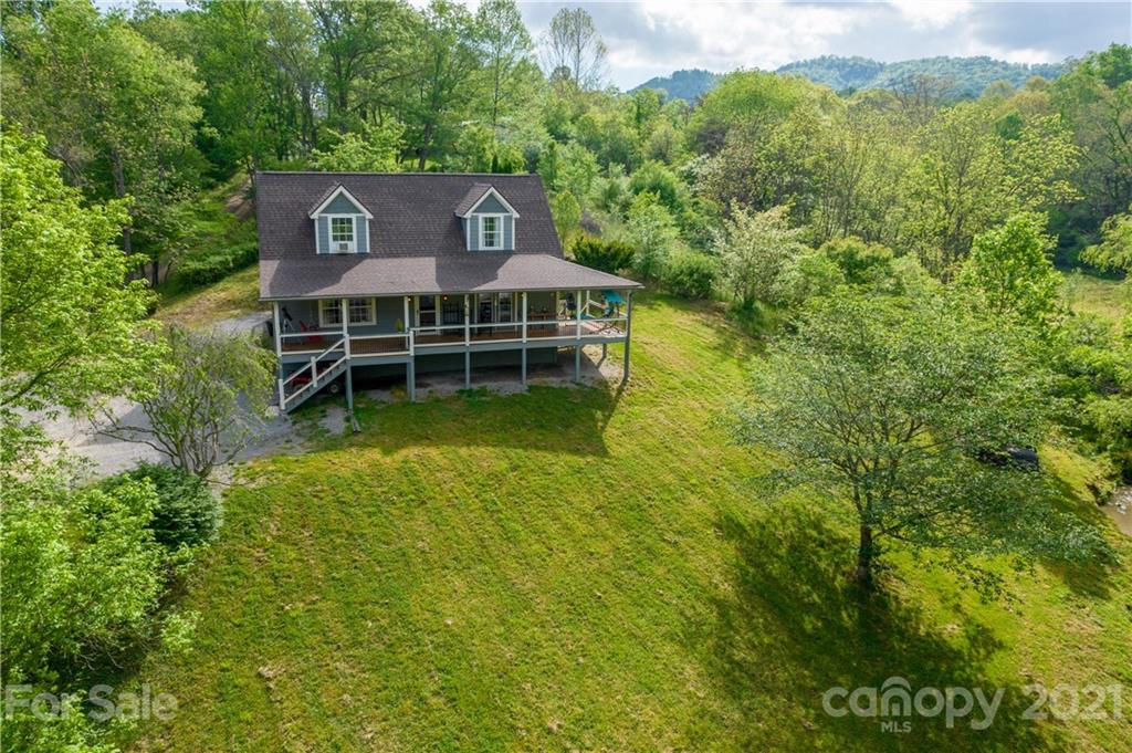 301 Fowler Lane Clyde, NC 28721 - Photo 1 of 47 a view of a house with a yard