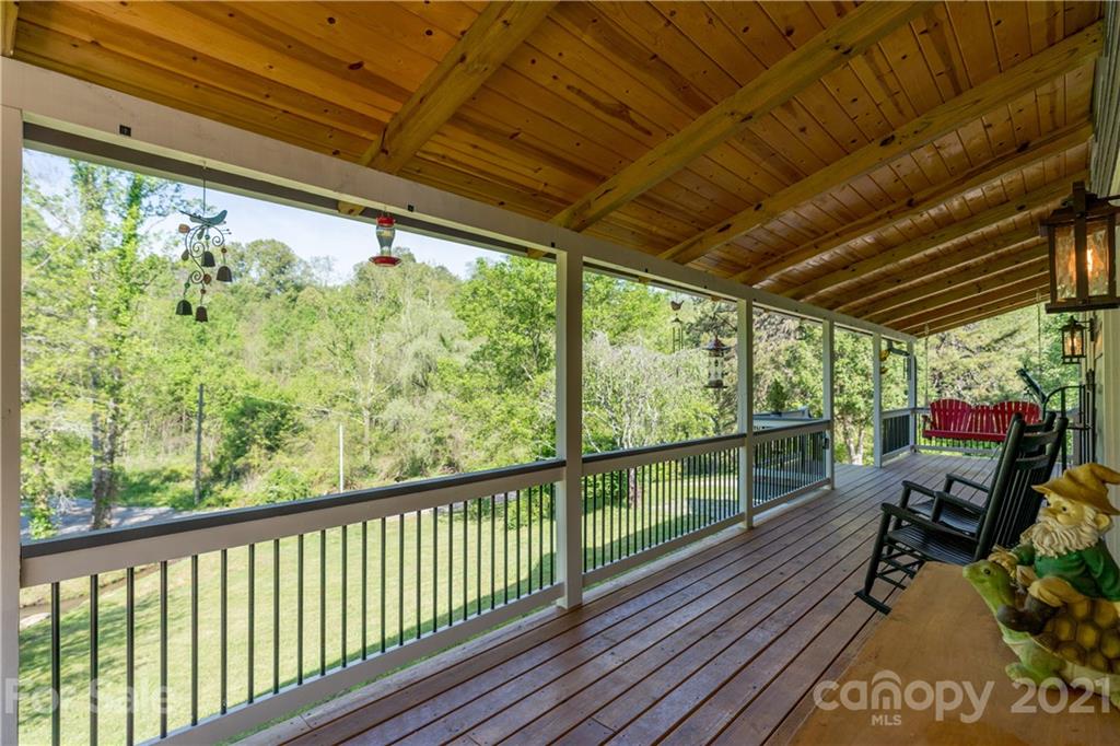 301 Fowler Lane Clyde, NC 28721 - Photo 17 of 47 a view of a two chairs in the balcony