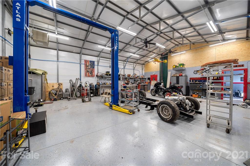 301 Fowler Lane Clyde, NC 28721 - Photo 21 of 47 a view of a storage room with gym equipment