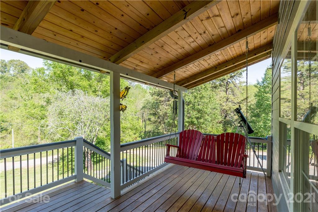 301 Fowler Lane Clyde, NC 28721 - Photo 24 of 47 a view of balcony with wooden floor