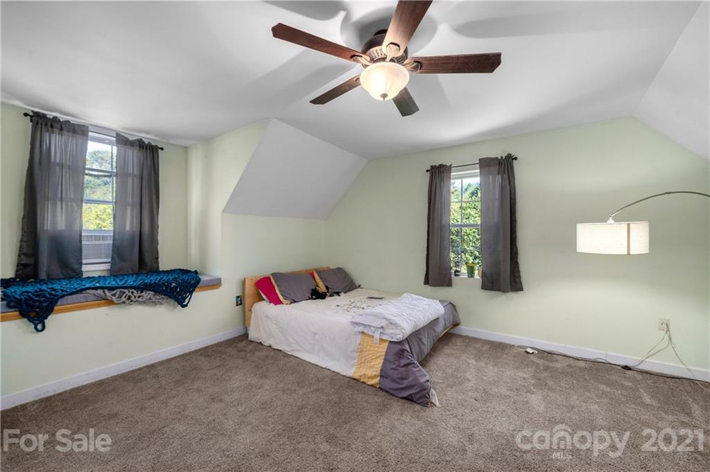 301 Fowler Lane Clyde, NC 28721 - Photo 36 of 47 a bedroom with bed and window