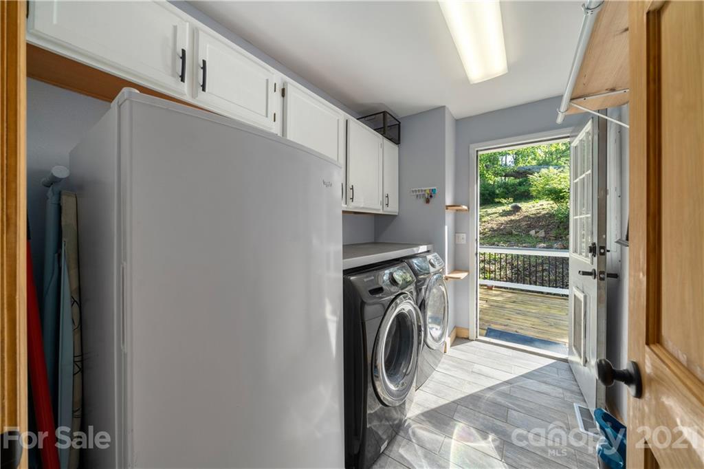 301 Fowler Lane Clyde, NC 28721 - Photo 38 of 47 a view of a kitchen with washer and dryer