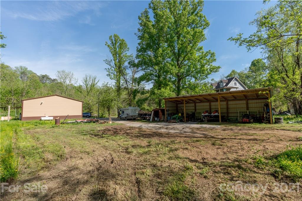 301 Fowler Lane Clyde, NC 28721 - Photo 39 of 47 a view of a house with a yard