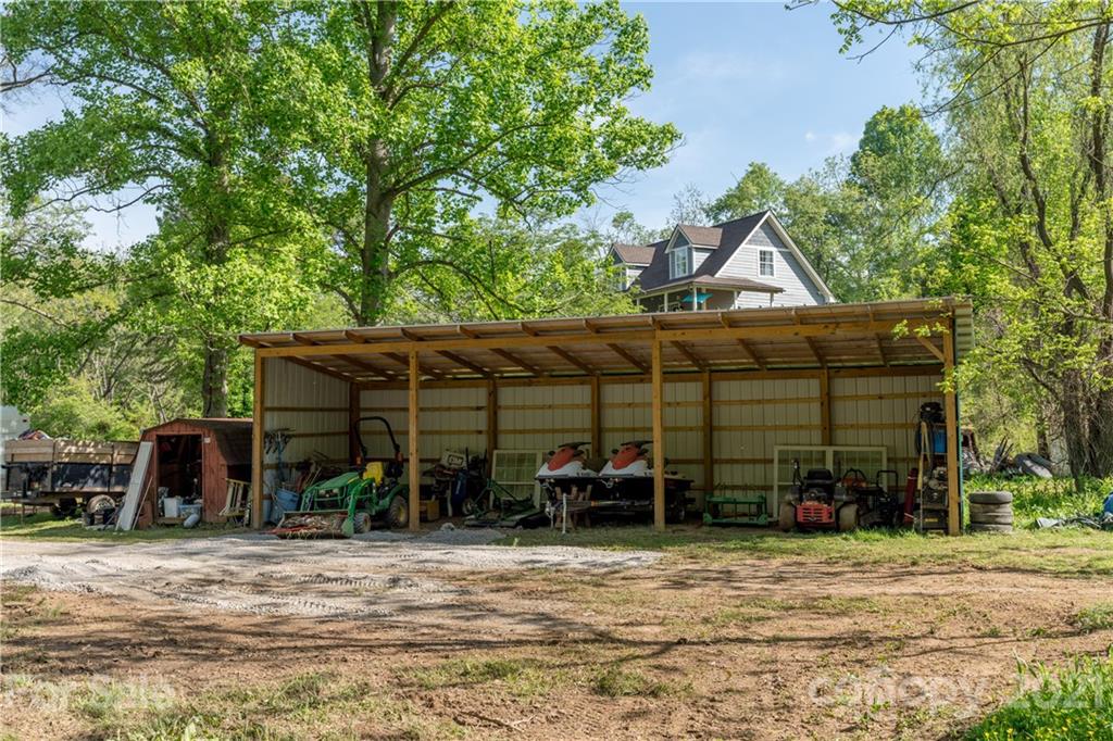 301 Fowler Lane Clyde, NC 28721 - Photo 40 of 47 a front view of a house with garden