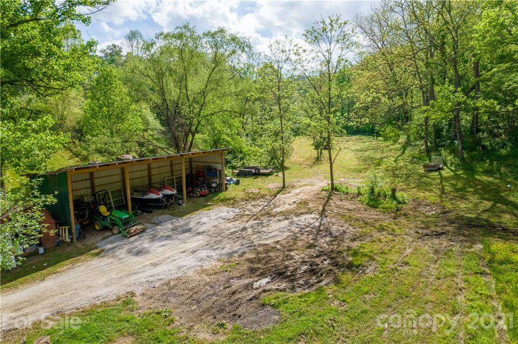 301 Fowler Lane Clyde, NC 28721 - Photo 41 of 47 a backyard of a house with lots of green space