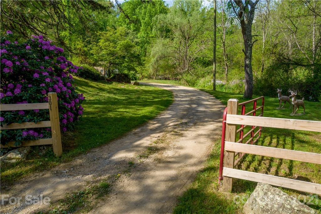 301 Fowler Lane Clyde, NC 28721 - Photo 47 of 47 a view of a bench in a garden