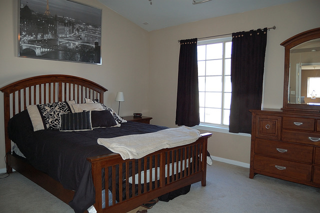 3433 Ravinia Circle Aurora, IL 60504 - Photo 14 of 23 a bedroom with a bed and a window