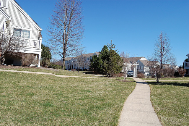 3433 Ravinia Circle Aurora, IL 60504 - Photo 22 of 23 a view of a house with a yard