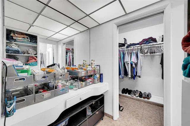 a room with a bed and furniture