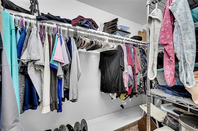 a bathroom with a sink vanity and a mirror