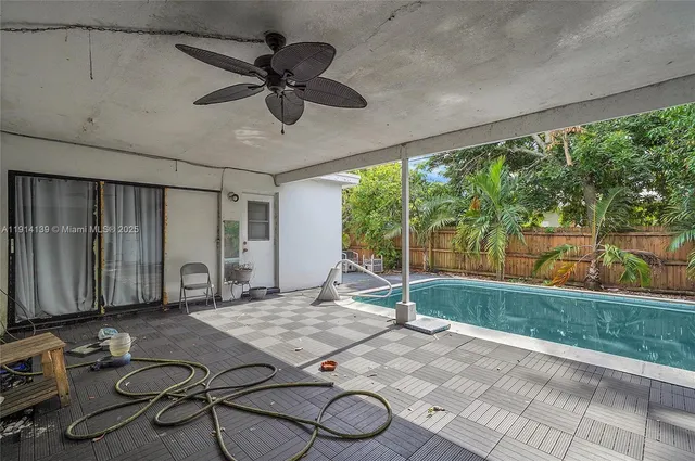 a room with gym equipment and a large window
