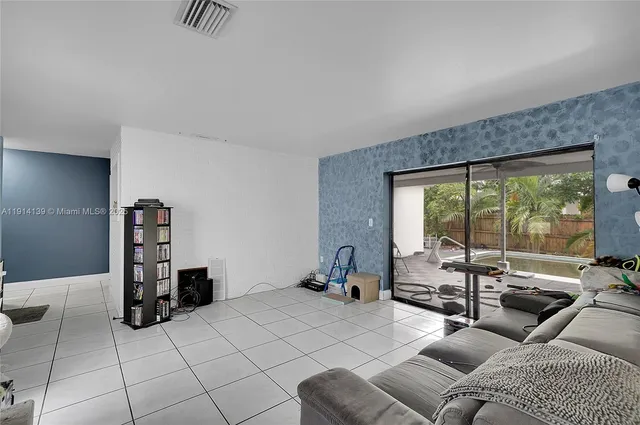 a view of room with furniture and closet