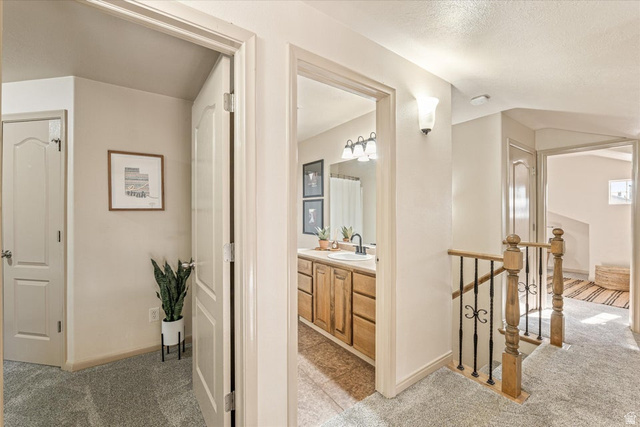 345 North 2450th Street East, Unit 152 St. George, UT 84790 - Photo 26 of 40 Bathroom with light carpet and vanity