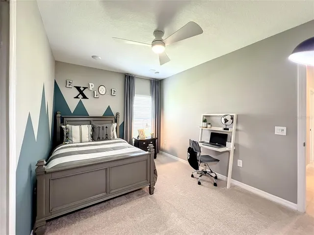 a bathroom with a double vanity sink toilet and shower