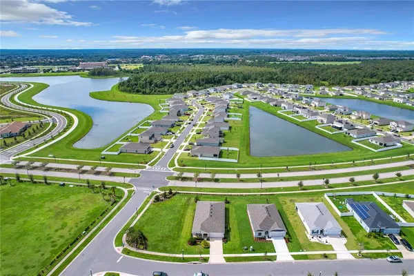 a view of swimming pool with a yard and outdoor seating