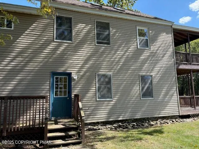 a view of a field with an ocean