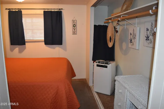 a bathroom with a granite countertop shower and a sink