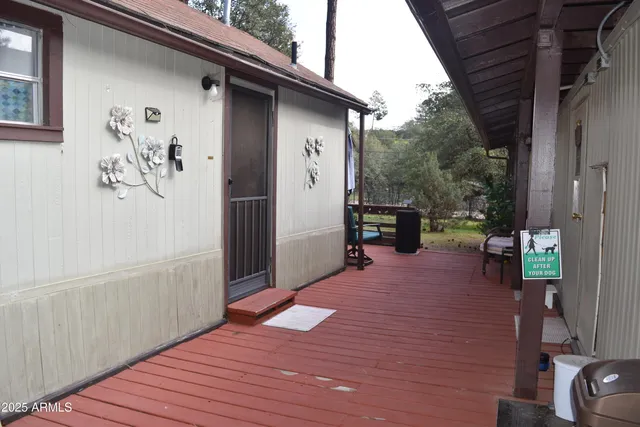 a view of outdoor space and wooden deck