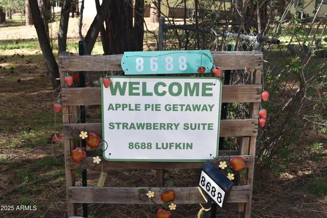 street sign on the side of building
