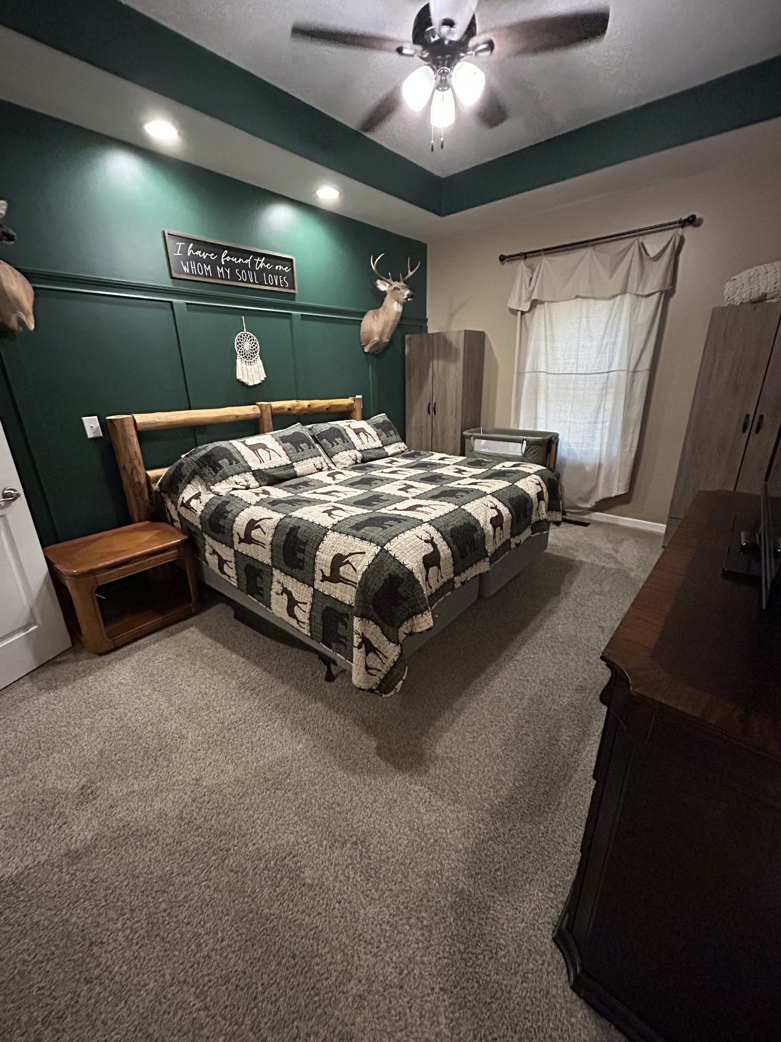 999 Featherstone Cemetary Road Decherd, TN 37324 - Photo 14 of 19 a bed room with a bed and a chandelier