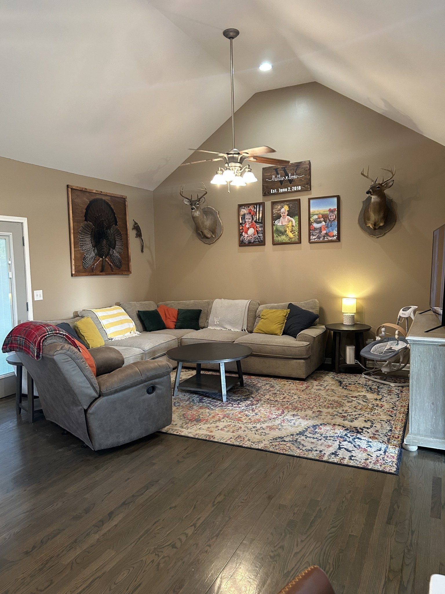 999 Featherstone Cemetary Road Decherd, TN 37324 - Photo 2 of 19 a living room with furniture and a flat screen tv