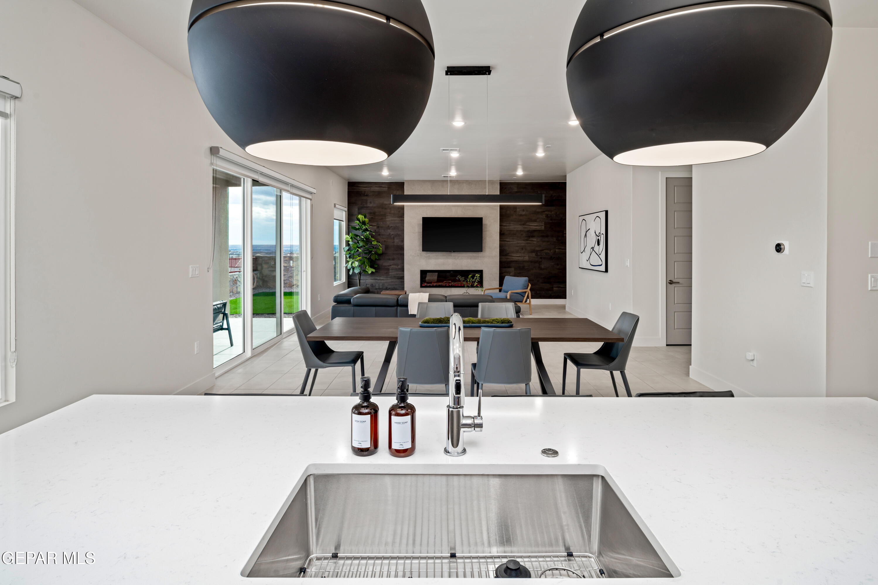 7280 Cimarron Rim Drive El Paso, TX 79911 - Photo 3 of 8 a living room with furniture and a large window