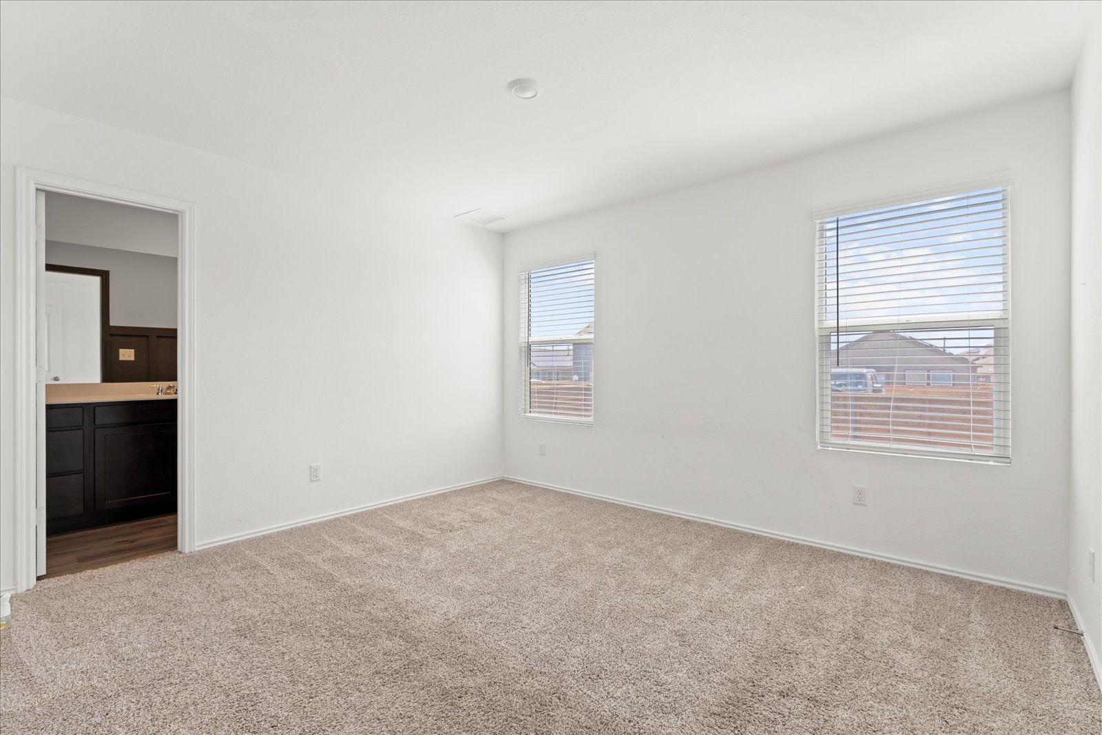 905 Powell Kyle, TX 78640 - Photo 17 of 37 a view of an empty room with a window