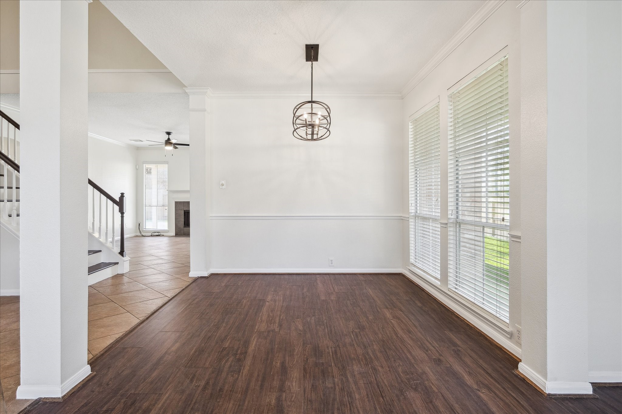 12831 Dove Point Lane Houston, TX 77041 - Photo 12 of 49 a view of empty room with wooden floor and fan