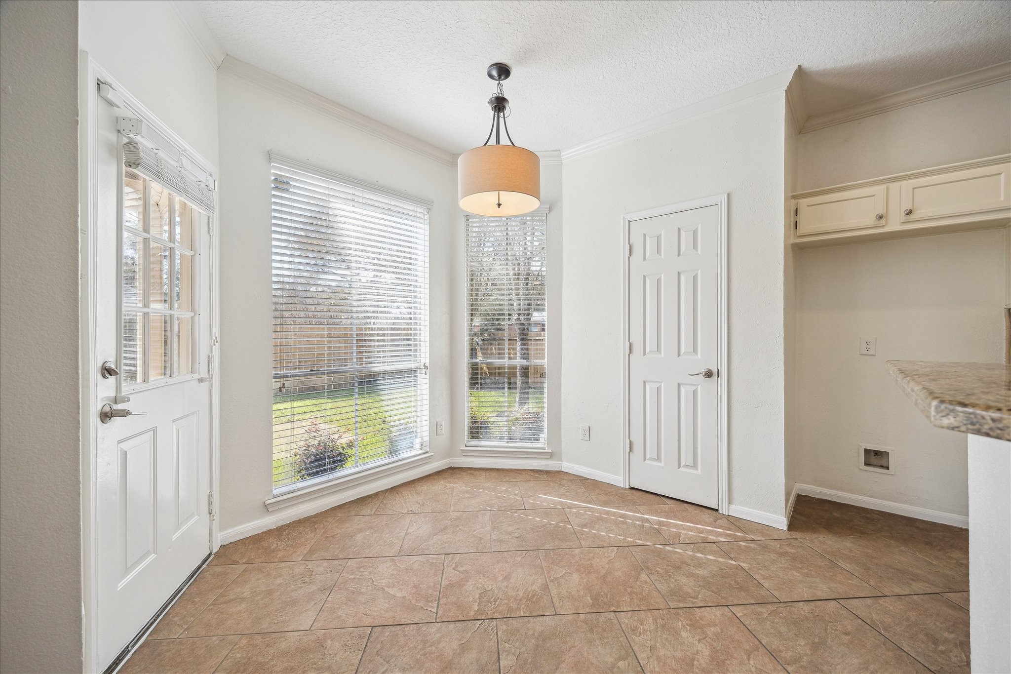 12831 Dove Point Lane Houston, TX 77041 - Photo 26 of 49 a view of a room with wooden floor and windows