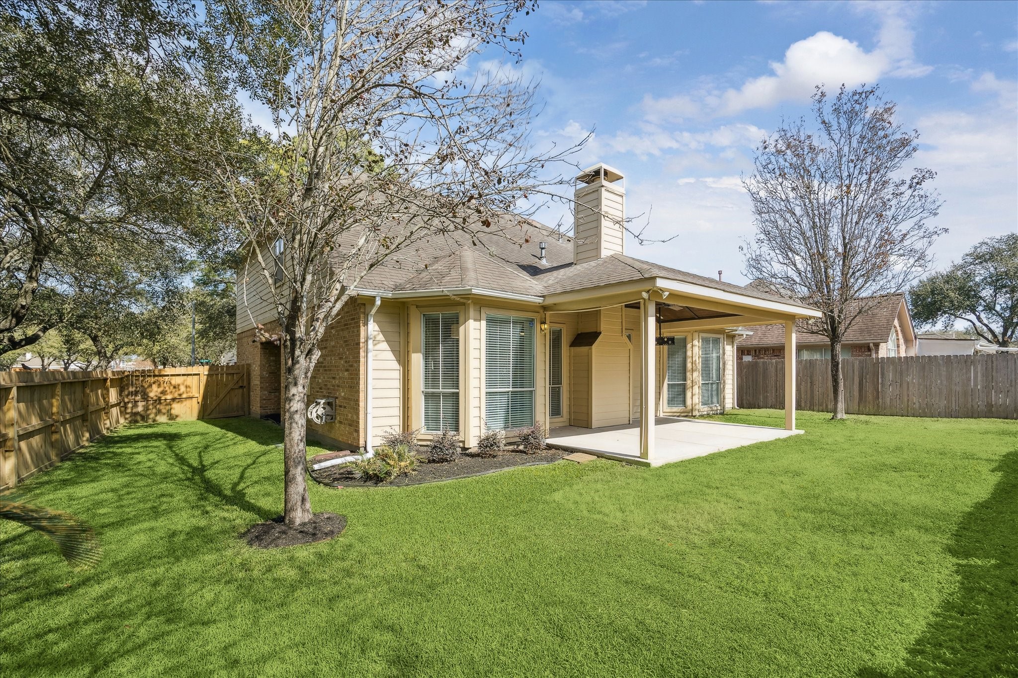 12831 Dove Point Lane Houston, TX 77041 - Photo 29 of 49 a front view of a house with a yard