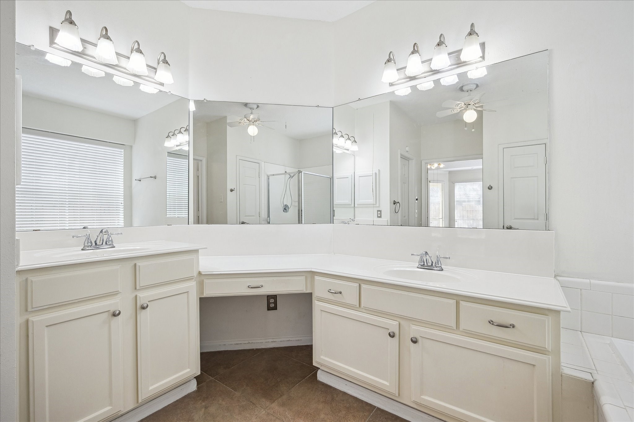 12831 Dove Point Lane Houston, TX 77041 - Photo 38 of 49 a spacious bathroom with a granite countertop sink a large mirror and vanity