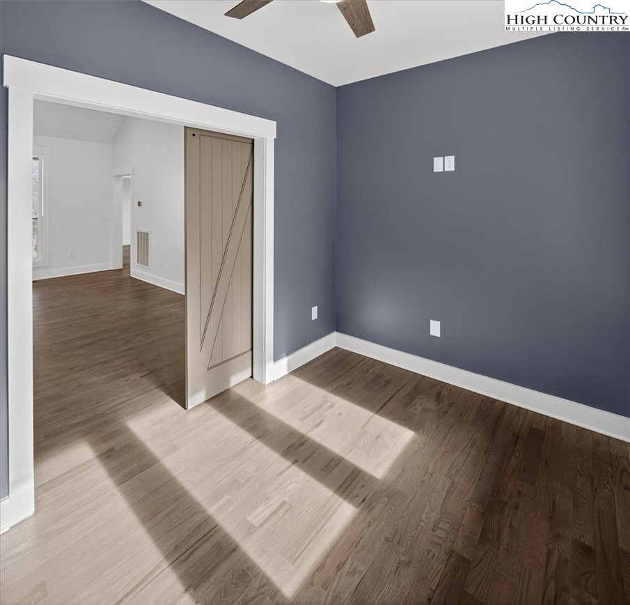 20 Busic Ridge Sparta, NC 28675 - Photo 20 of 50 a view of a room with wooden floor