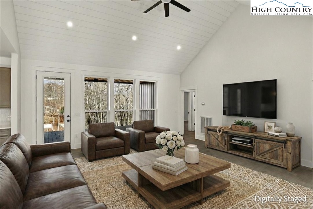 20 Busic Ridge Sparta, NC 28675 - Photo 4 of 50 a living room with furniture and a flat screen tv