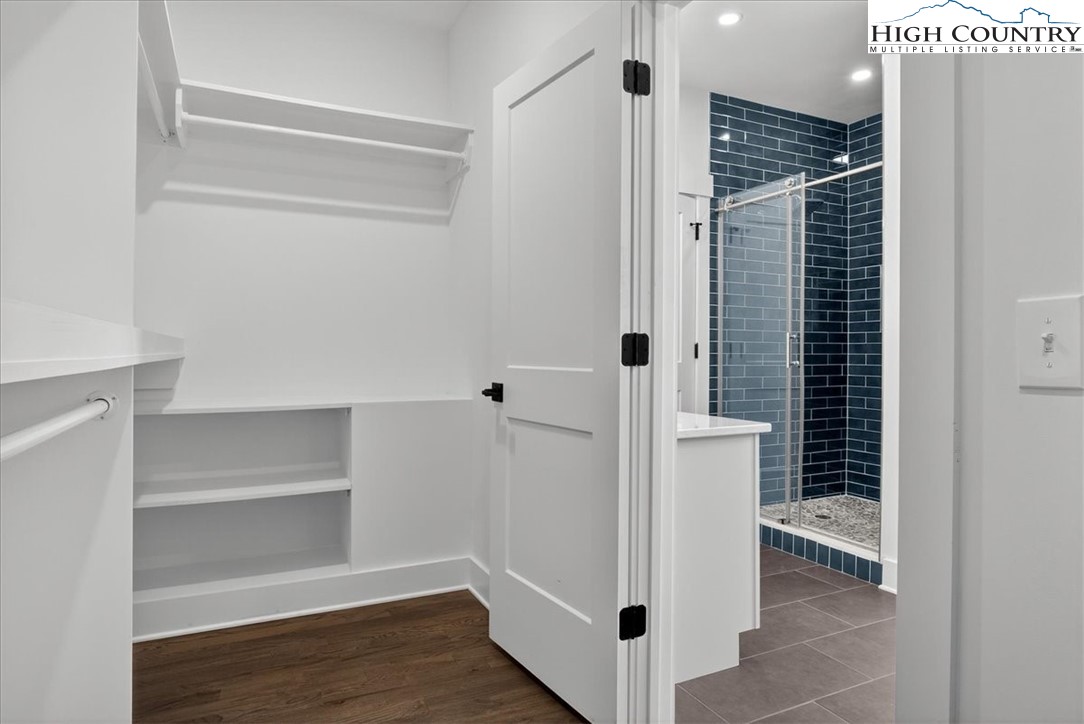 20 Busic Ridge Sparta, NC 28675 - Photo 42 of 50 a view of walk in closet with empty racks