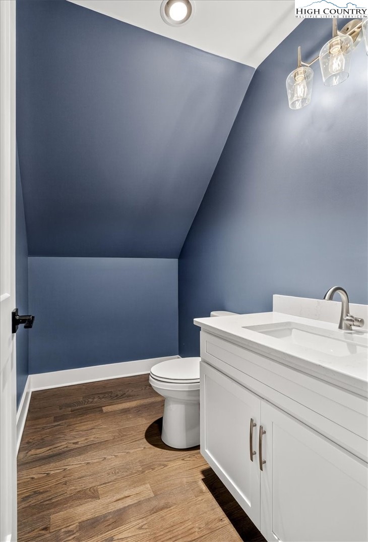 20 Busic Ridge Sparta, NC 28675 - Photo 46 of 50 a bathroom with a toilet and a sink