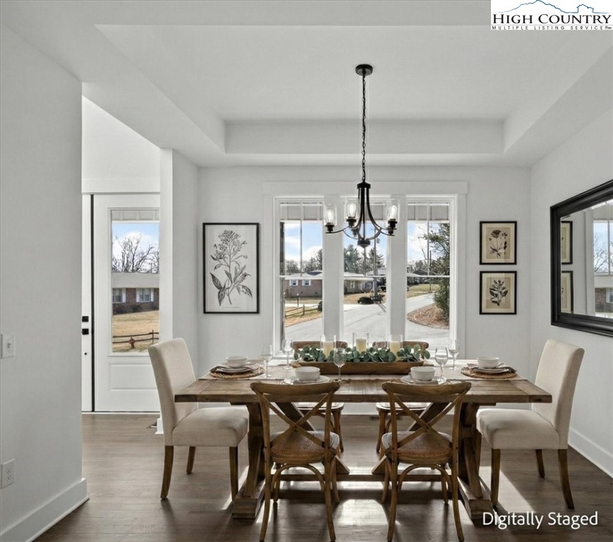 20 Busic Ridge Sparta, NC 28675 - Photo 7 of 50 a view of a dining room with furniture window and wooden floor