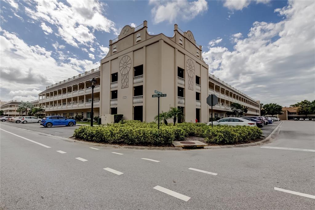 2170 Americus Boulevard North, Unit 64 Clearwater, FL 33763 - Photo 1 of 66 a large building with a street