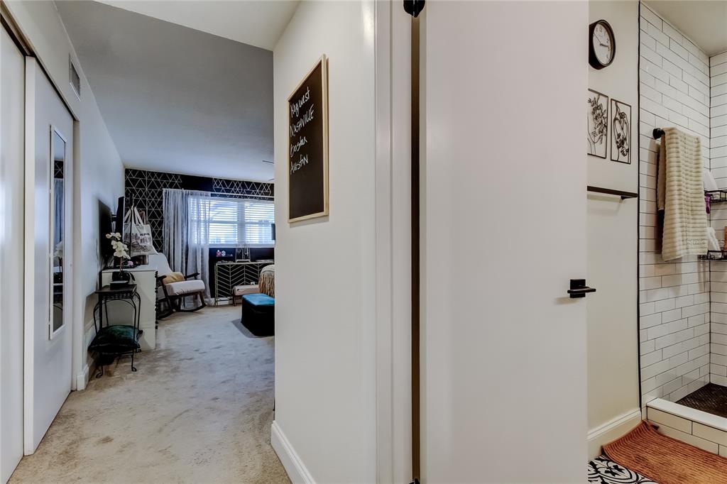 2170 Americus Boulevard North, Unit 64 Clearwater, FL 33763 - Photo 29 of 66 a view of a livingroom with furniture and windows