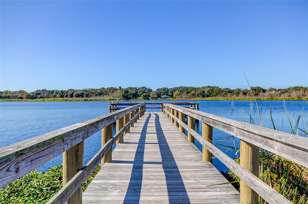 2170 Americus Boulevard North, Unit 64 Clearwater, FL 33763 - Photo 39 of 66 a view of wooden floor with a lake
