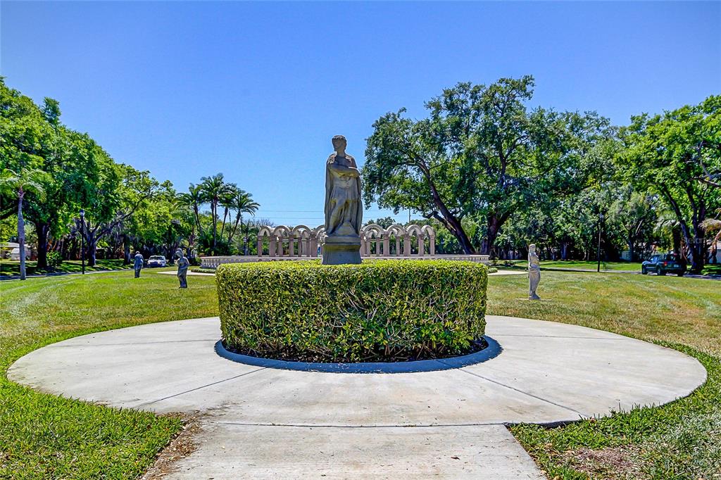 2170 Americus Boulevard North, Unit 64 Clearwater, FL 33763 - Photo 41 of 66 a view of a park with large trees