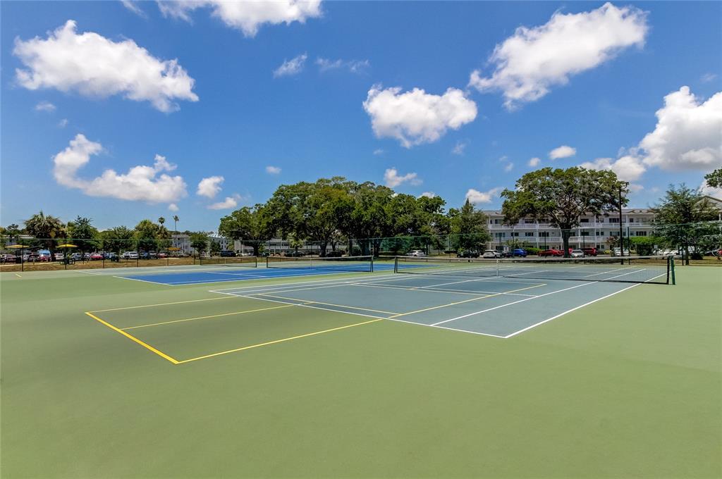 2170 Americus Boulevard North, Unit 64 Clearwater, FL 33763 - Photo 49 of 66 a view of a tennis court
